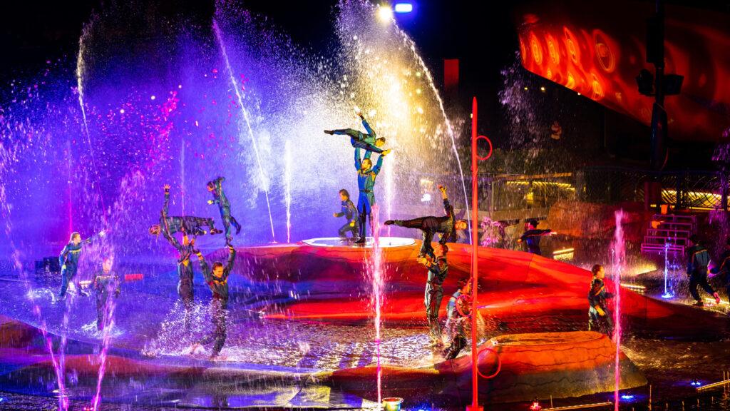 Acrobatic artists stood in fountain show